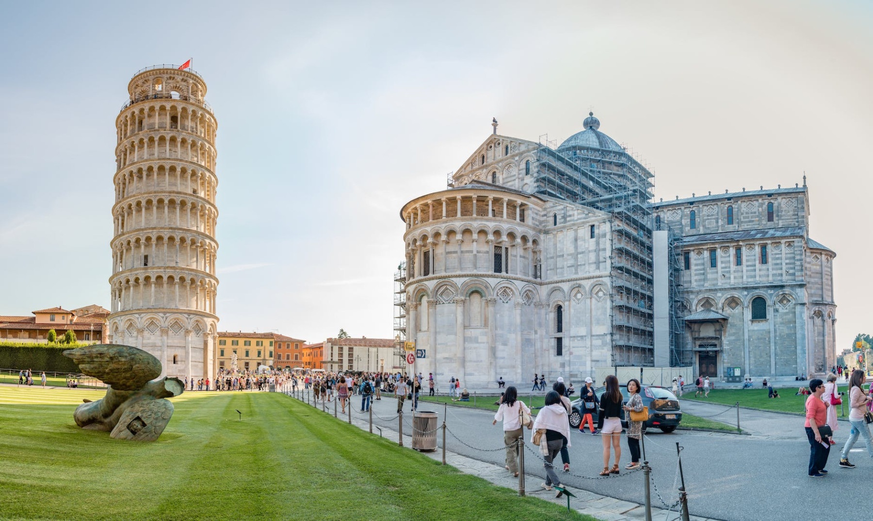 tourists visiting the famous tower of pisa and cathedral in pisa italy