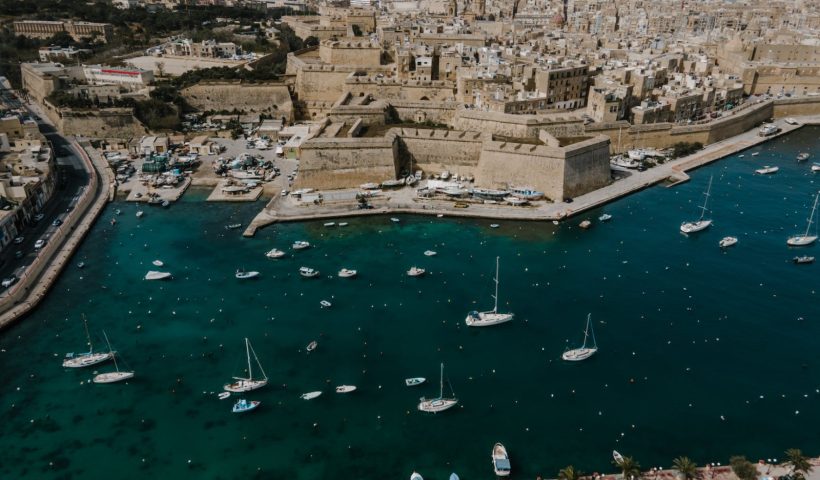 an aerial shot of the grand harbour in malta